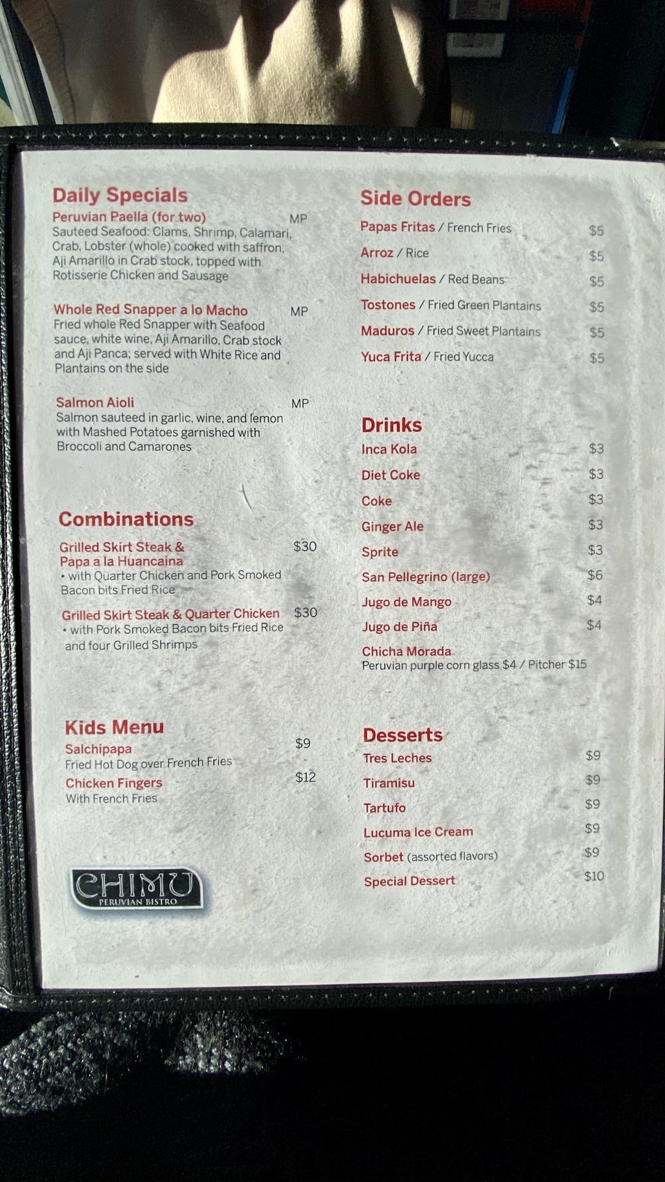 Steak and seafood dishes listed for dinner